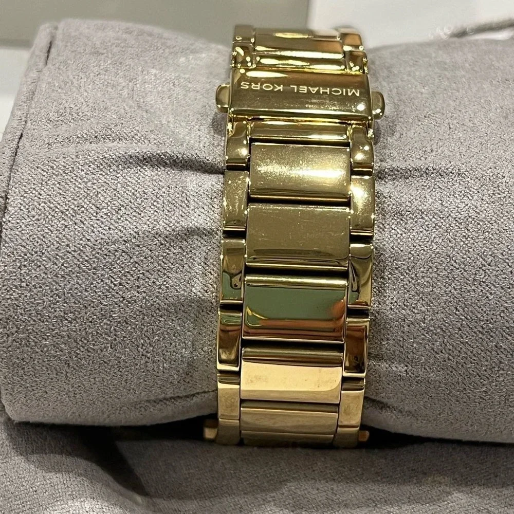 Michael Kors jeweled gold colored‎ watch with box, bag, pillow needs batteries